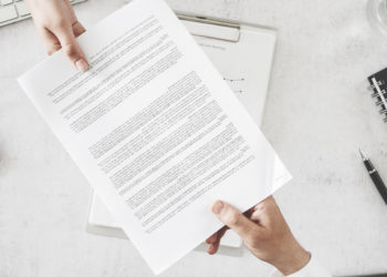 paper in hands